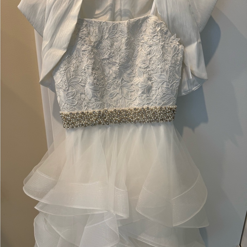 Brand new, never worn Jovani evening dress for a young teenager.